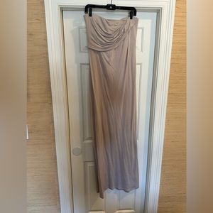 Twenty - strapless tan dress.